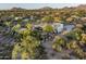 Expansive desert property featuring mature landscaping with mountain views at 22022 N Calle Royale Dr, Scottsdale, AZ 85255