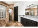 Modern bathroom features a glass enclosed shower and vanity with white counter top at 22022 N Calle Royale Dr, Scottsdale, AZ 85255