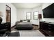 Cozy bedroom with hardwood floors, natural light, and modern furnishings at 22022 N Calle Royale Dr, Scottsdale, AZ 85255
