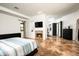 Spacious main bedroom features tiled floors, a fireplace, and ensuite bath and office access at 22022 N Calle Royale Dr, Scottsdale, AZ 85255