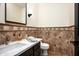 Elegant powder room with patterned tile, modern fixtures, and a floating vanity at 22022 N Calle Royale Dr, Scottsdale, AZ 85255