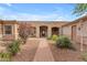 Beautiful entrance to home with mature landscaping and stone features at 2285 E Plum St, Gilbert, AZ 85298