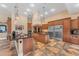 Expansive open kitchen with island, stainless steel appliances, and ample counter space at 2285 E Plum St, Gilbert, AZ 85298