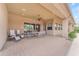Covered patio area perfect for outdoor dining and entertaining with views of the backyard at 2285 E Plum St, Gilbert, AZ 85298