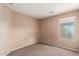 Neutral bedroom featuring a window at 23613 W Mobile Ln, Buckeye, AZ 85326