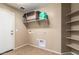 Bright storage room featuring custom shelving at 23613 W Mobile Ln, Buckeye, AZ 85326