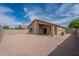 Backyard featuring an open patio and low maintenance landscaping at 2518 W Carson Rd, Phoenix, AZ 85041