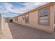 Side yard featuring low maintenance desert landscaping, offering practical beauty and easy upkeep at 2518 W Carson Rd, Phoenix, AZ 85041