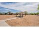 Community park picnic area featuring a shade structure, offering a serene outdoor recreational space at 2518 W Carson Rd, Phoenix, AZ 85041