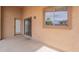 Back patio with a covered ceiling and ample space at 2518 W Carson Rd, Phoenix, AZ 85041