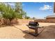 Backyard view showcasing a built-in gas grill for outdoor cooking and entertaining at 2590 S Buckaroo Trl, Gilbert, AZ 85295
