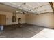 This spacious garage features an automatic door, plenty of storage space, and a water heater at 2590 S Buckaroo Trl, Gilbert, AZ 85295