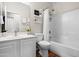 Well-lit bathroom featuring a vanity, toilet, and a shower/tub combination with a white curtain at 2834 E Devon Ct, Gilbert, AZ 85296
