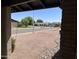Street view from the covered porch area featuring desert landscaping and neighborhood homes at 3102 N Woodburne Dr, Chandler, AZ 85224