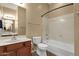 Bathroom with a single sink vanity and a shower-tub combo at 34944 N Mirandesa Dr, San Tan Valley, AZ 85143