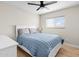 Cozy bedroom featuring a ceiling fan, and a window with natural light at 35360 N 93Rd Way, Scottsdale, AZ 85262