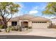 Charming single-story home featuring a tile roof, desert landscaping, and a two-car garage at 35360 N 93Rd Way, Scottsdale, AZ 85262