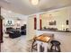The living room features wood-look tile floors, brick fireplace and glass doors to the lanai at 3924 E Cortez St, Phoenix, AZ 85028