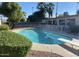 Sparkling swimming pool with a diving board and a surrounding patio perfect for outdoor entertainment at 3924 E Cortez St, Phoenix, AZ 85028