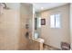 Bathroom shower featuring glass enclosure and mounted dispensers at 3924 E Cortez St, Phoenix, AZ 85028