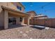 The covered patio and backyard provide a comfortable outdoor retreat at 41251 W Barcelona Dr, Maricopa, AZ 85138