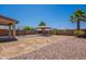 Spacious backyard features a gazebo and a palm tree, perfect for outdoor enjoyment at 41251 W Barcelona Dr, Maricopa, AZ 85138