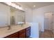 Bright bathroom with double sink vanity, soaking tub, and separate shower at 41251 W Barcelona Dr, Maricopa, AZ 85138