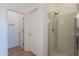 Bright bathroom showing glass enclosed shower with modern fixtures at 41251 W Barcelona Dr, Maricopa, AZ 85138