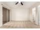 The bedroom showcases a sliding glass door and a door to a closet for ample storage at 420 W Yukon Dr # 8, Phoenix, AZ 85027
