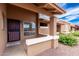 Inviting covered front porch with a decorative ledge and trimmed entry, providing a warm welcome at 420 W Yukon Dr # 8, Phoenix, AZ 85027