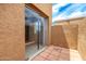 Private patio with a sliding glass door and tiled flooring, perfect for outdoor relaxation and entertaining at 420 W Yukon Dr # 8, Phoenix, AZ 85027