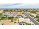 Panoramic aerial view of a community with lovely homes, lawns, and mature trees at 4622 E Ellis Cir, Mesa, AZ 85205