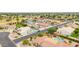 Inviting neighborhood aerial showcasing homes with refreshing pools and desert landscaping at 4622 E Ellis Cir, Mesa, AZ 85205