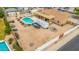 Aerial view of the backyard showcasing a pool, patio, and spacious layout for outdoor activities and relaxation at 4622 E Ellis Cir, Mesa, AZ 85205