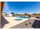 Spacious backyard features a sparkling pool, spa, and well-maintained desert landscaping at 4622 E Ellis Cir, Mesa, AZ 85205
