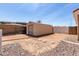 Backyard features a detached garage/shed and space to park toys at 4622 E Ellis Cir, Mesa, AZ 85205