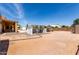 Wide open backyard ready for toys, including a detached garage/shed and water feature at 4622 E Ellis Cir, Mesa, AZ 85205