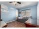 Cozy bedroom with a whimsical cloud mural and a comfortable daybed at 4622 E Ellis Cir, Mesa, AZ 85205