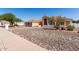 Beautiful single-story home with neutral stucco, tile roof, and desert landscaping at 4622 E Ellis Cir, Mesa, AZ 85205
