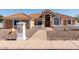 Inviting single-Gathering home with desert landscaping in front at 4622 E Ellis Cir, Mesa, AZ 85205