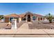 Inviting single-story home features a tiled roof, desert landscaping, and a walkway to the front door at 4622 E Ellis Cir, Mesa, AZ 85205