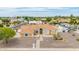 Charming home boasts a well-maintained desert landscape, tile roof, and welcoming facade in a desirable neighborhood at 4622 E Ellis Cir, Mesa, AZ 85205