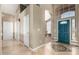 Spacious foyer with tile floors, neutral walls, and view to living spaces at 4622 E Ellis Cir, Mesa, AZ 85205