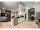 Open concept kitchen with stainless steel appliances and living area at 4622 E Ellis Cir, Mesa, AZ 85205