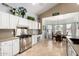 Bright kitchen with stainless appliances and an eat-in nook at 4622 E Ellis Cir, Mesa, AZ 85205