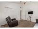 Bright living room with comfortable furniture and plenty of space at 4622 E Ellis Cir, Mesa, AZ 85205