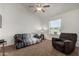 Bright living room featuring neutral carpeting, comfortable furniture and natural light at 4622 E Ellis Cir, Mesa, AZ 85205