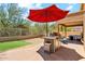 Backyard patio with a built in outdoor kitchen, grill, seating and desert views at 4759 E Woburn Ln, Cave Creek, AZ 85331