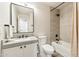 Bathroom featuring a modern vanity, toilet, and tiled shower/tub combo at 4759 E Woburn Ln, Cave Creek, AZ 85331