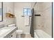 Cozy bathroom with a tiled shower, white toilet, and gray flooring at 4759 E Woburn Ln, Cave Creek, AZ 85331